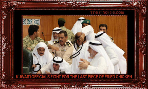 Kuwaiti officials fight for the last piece of fried chicken